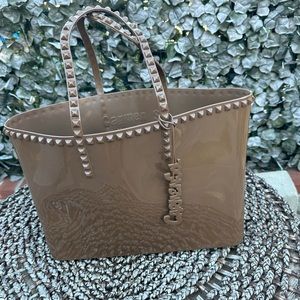 Medium plastic shopper bag , used gently some scuffing outside and inside